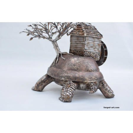 figure of turtle with tree metal